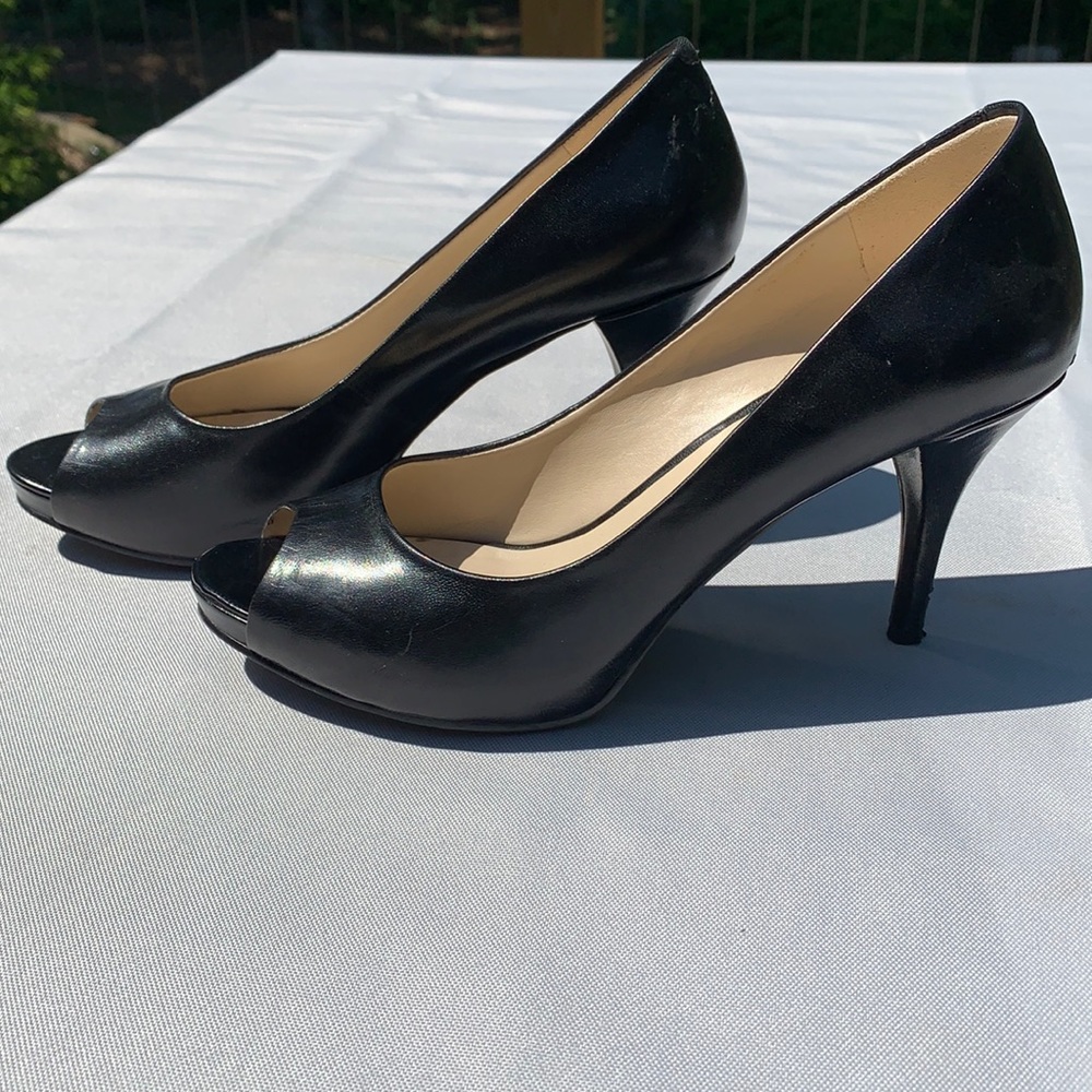 Nine West Peep Toe Pump. Black 6.5